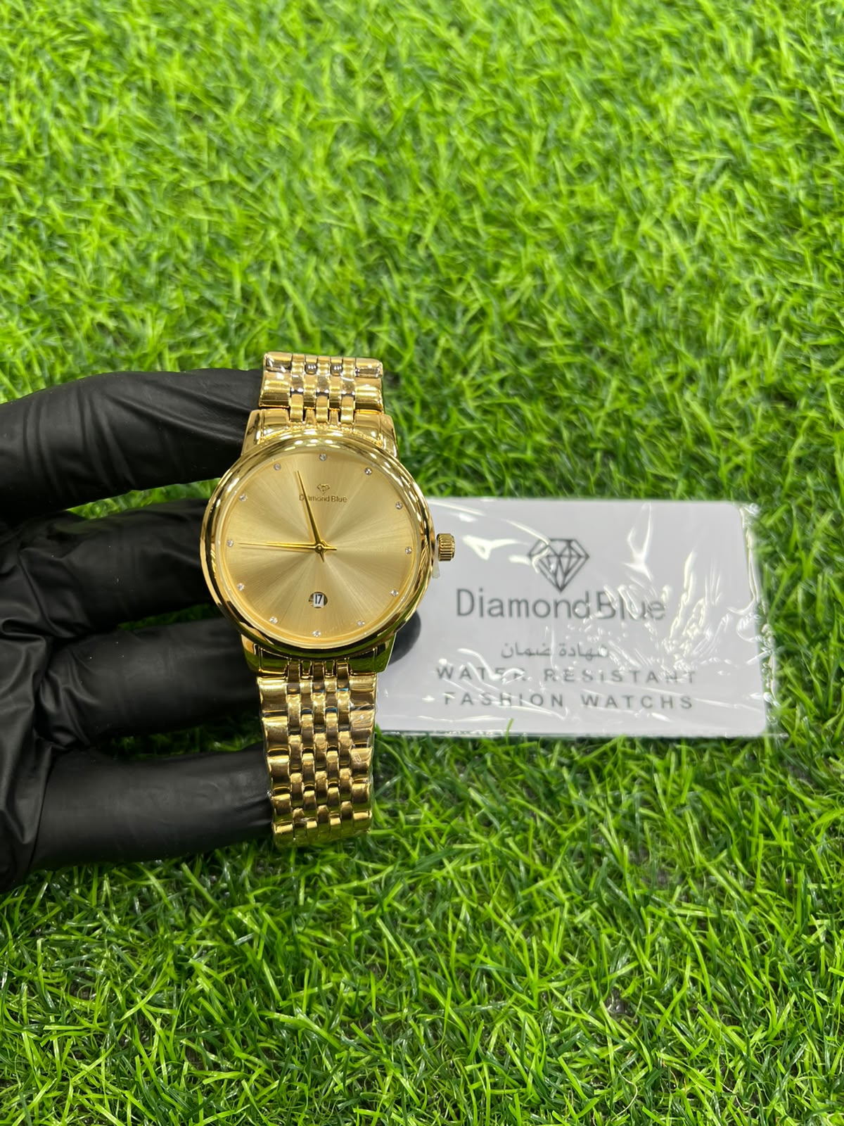 Helios gold-tone watch with sunburst dial