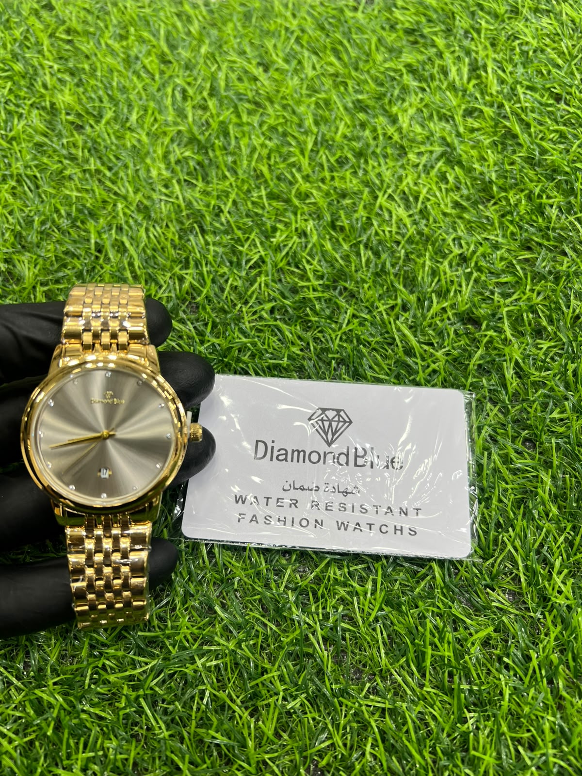 Solstice gold-tone watch with graphite dial