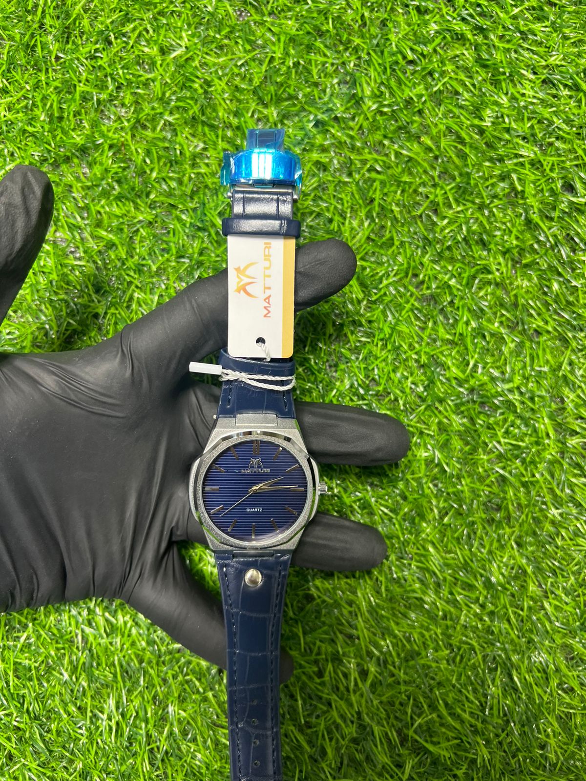 Indigo oval blue watch with dark strap