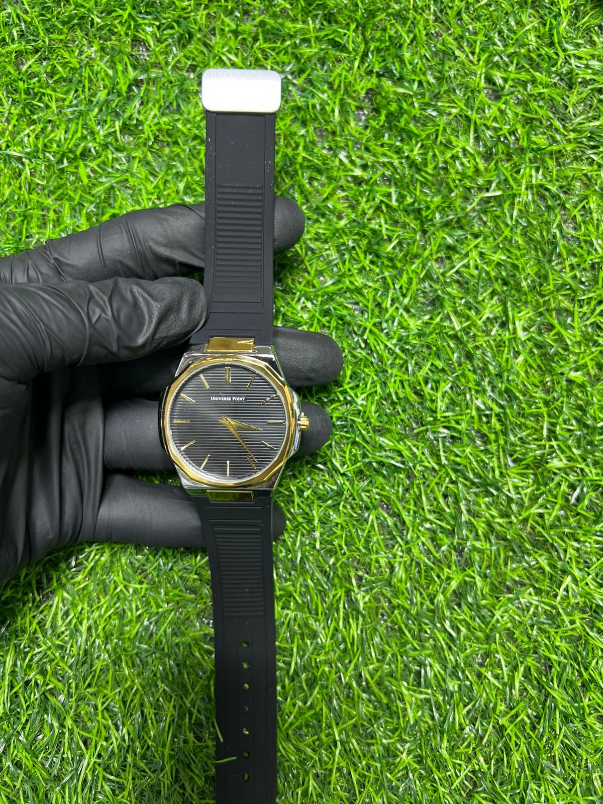Midnight black dial gold rim watch