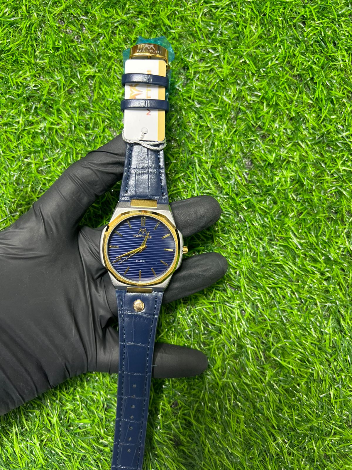 Mariner blue dial gold-tone case blue strap watch