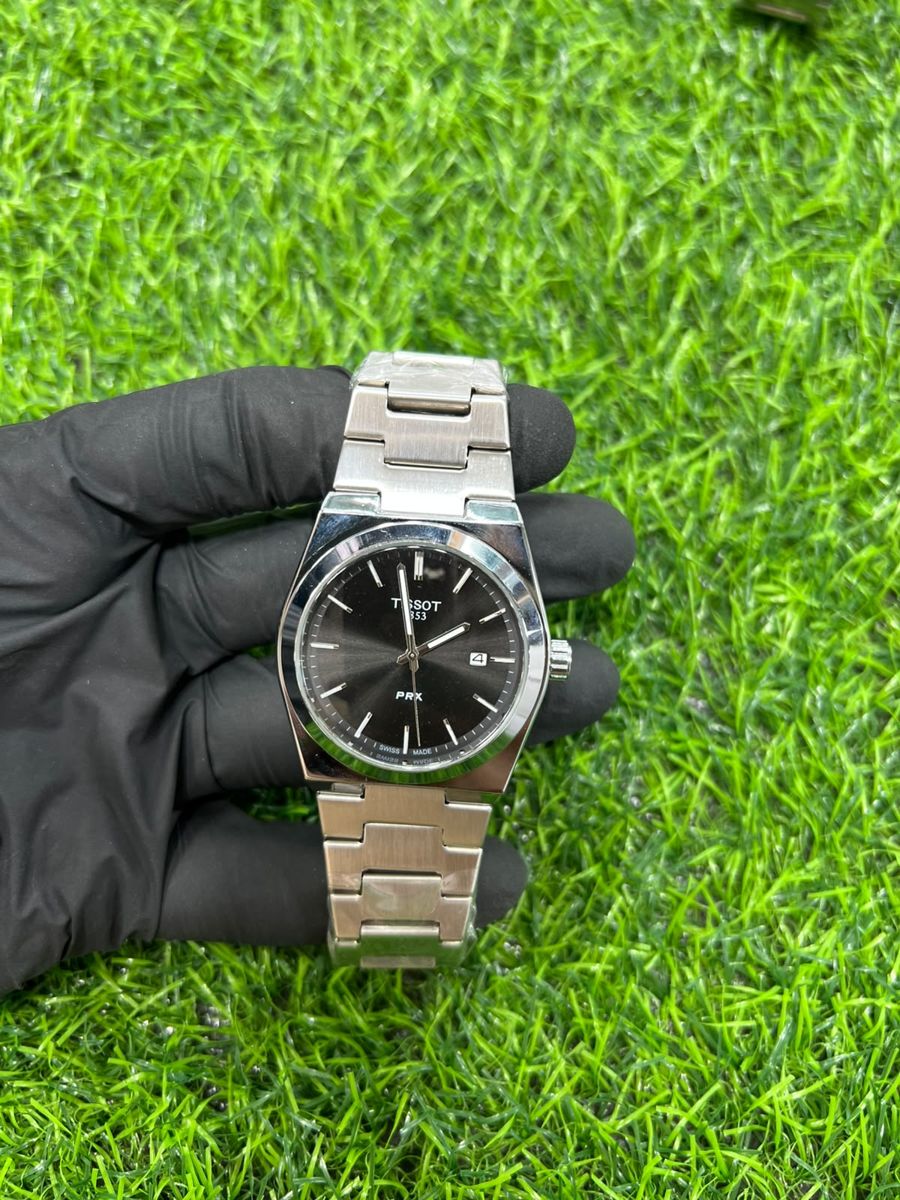 Black dial steel bracelet watch